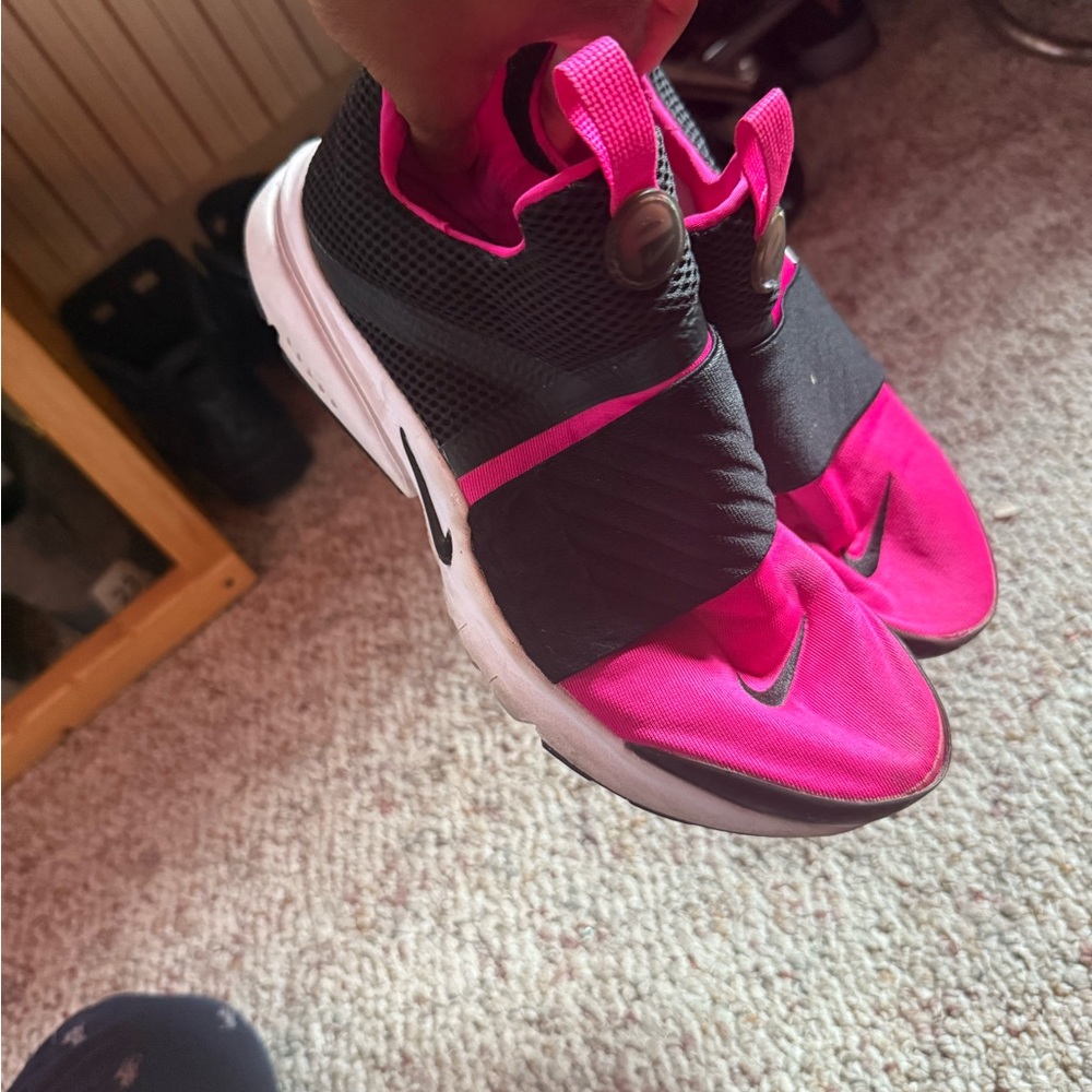 Nike Pink and Black Sneakers with Modern Design